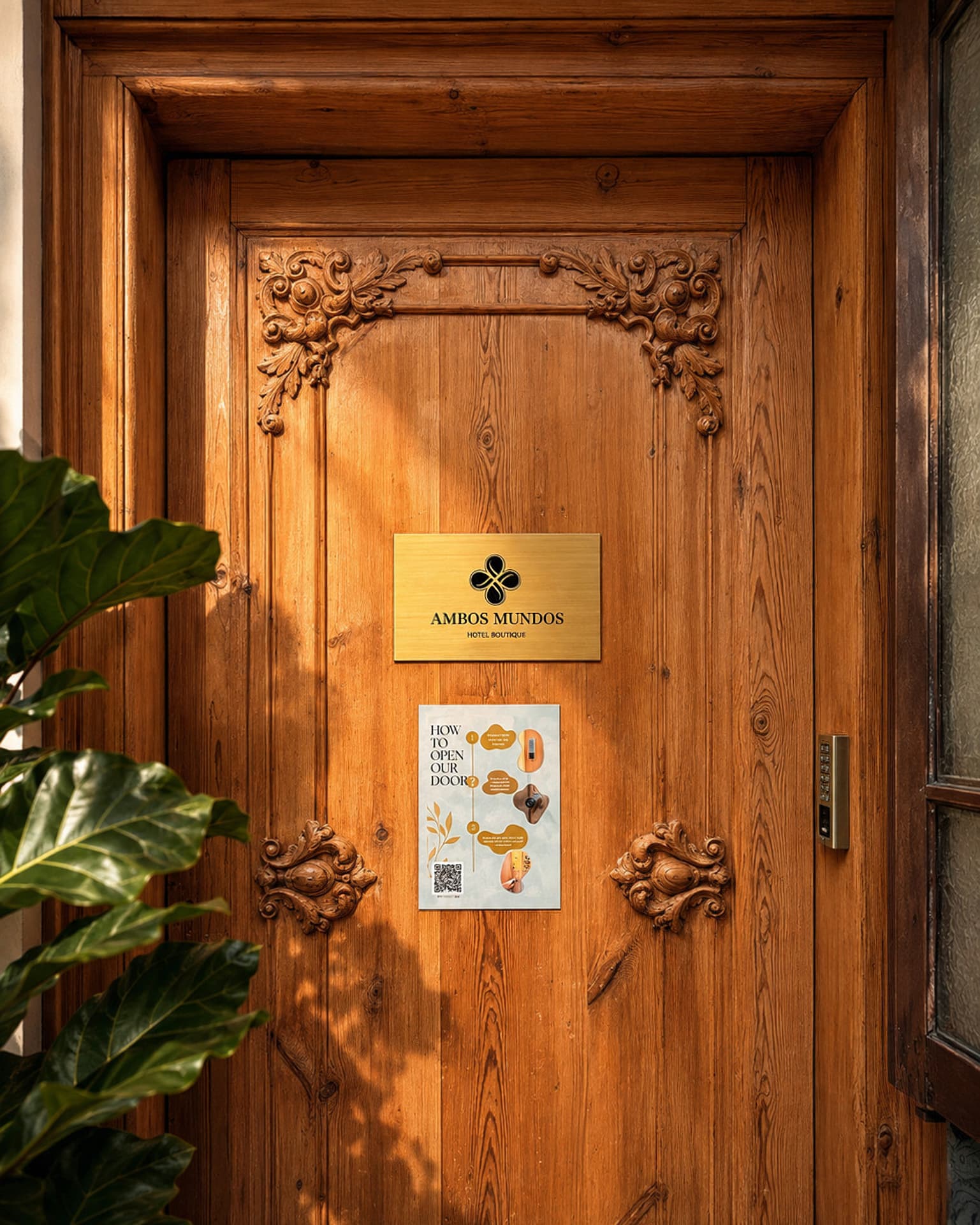 Ornate brass plaque and carved door at the entrance of Ambos Mundos, Barcelona